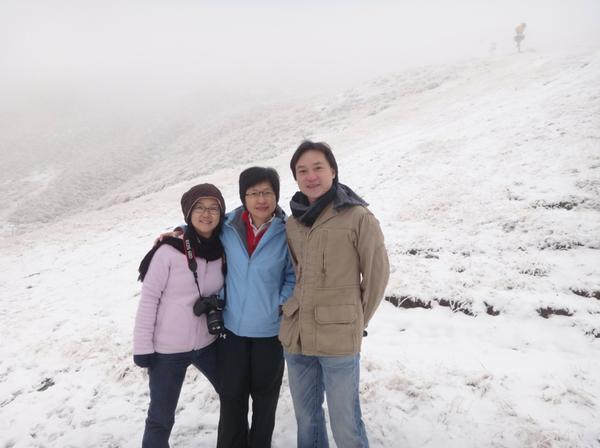 Visitors from Bangkok, Thailand revel in the new snow at Coronet Peak. Left to right are Tassanee Ratanaruangrai (41), Jutamas Kasemkulsiri (42) and  Pongthorn Thapanangkum (36)